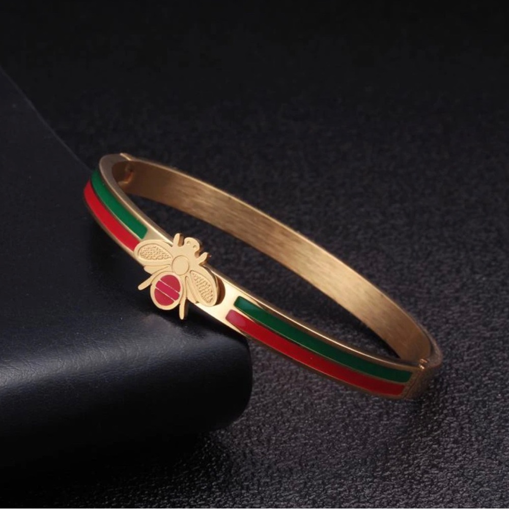 Gold bee bracelet.